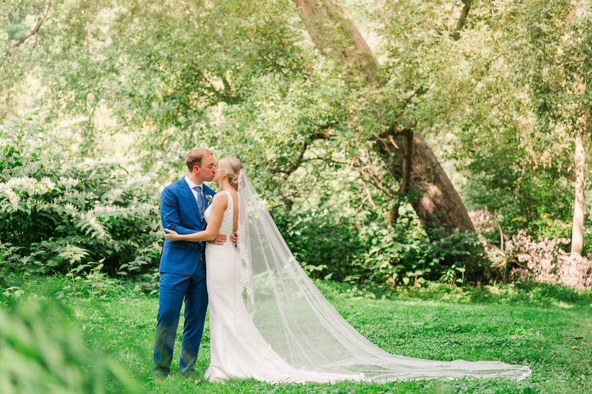 bride and groom photo at boat launch at YMCA Camp Kon-O-Kwee