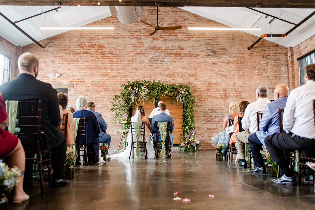 Emotional 'I Do' moment captured by Style & Grace Photography in Lincoln County, MO, during the wedding ceremony, showcasing the couple’s vows and commitment to one another.