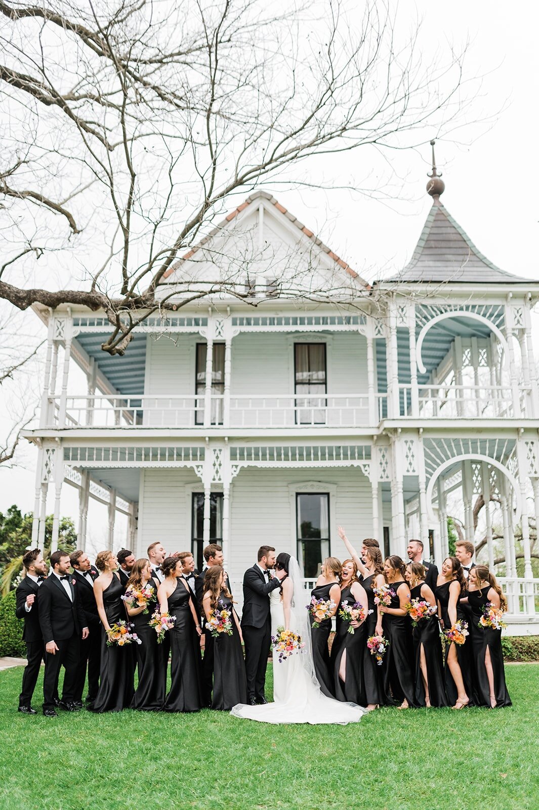 wedding-party-all-black-in-front-barr-mansion