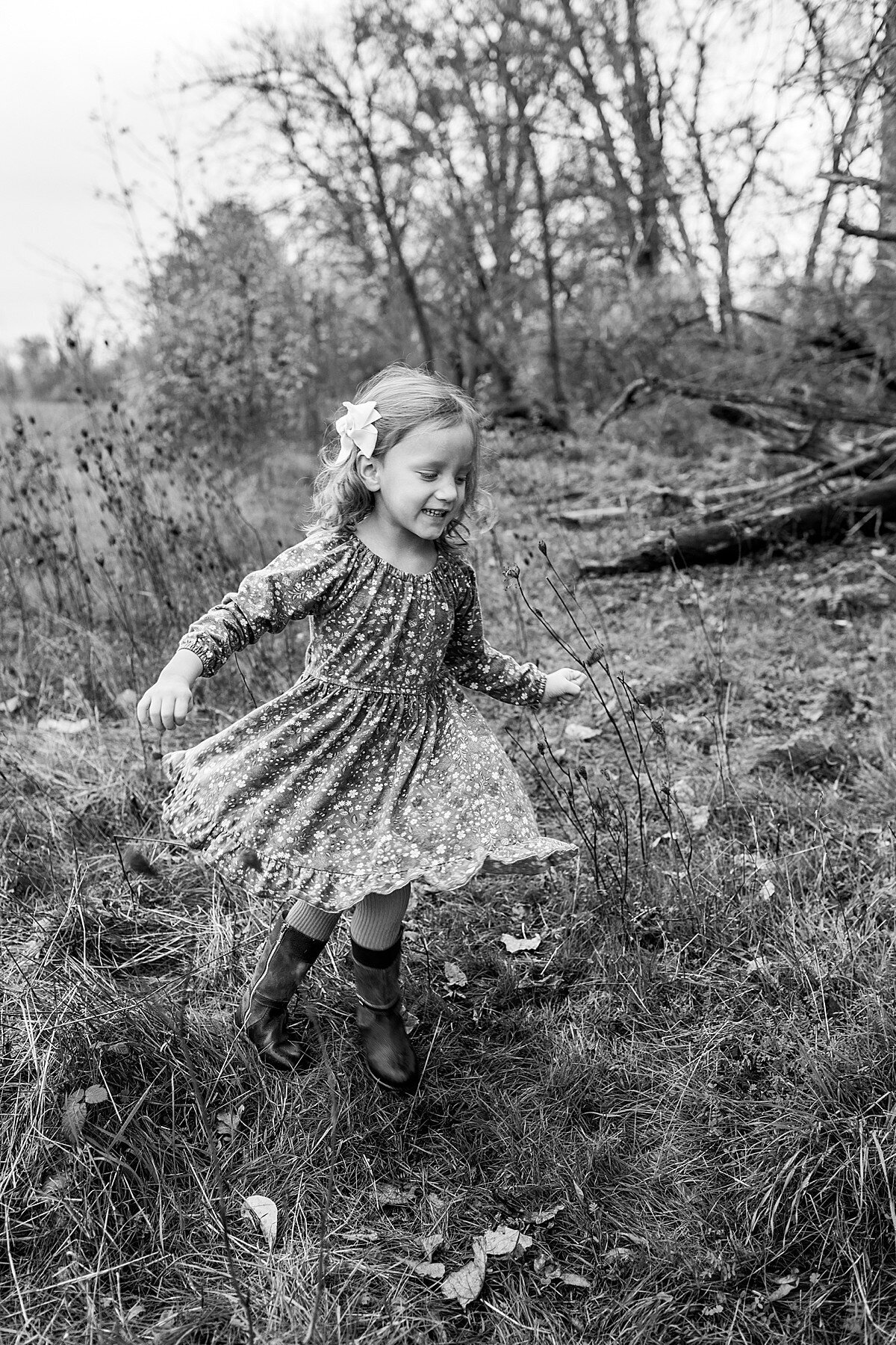 Toddler girl twirling her dress