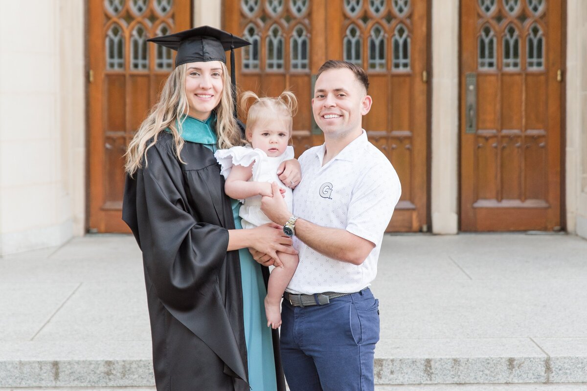 graduate female with family