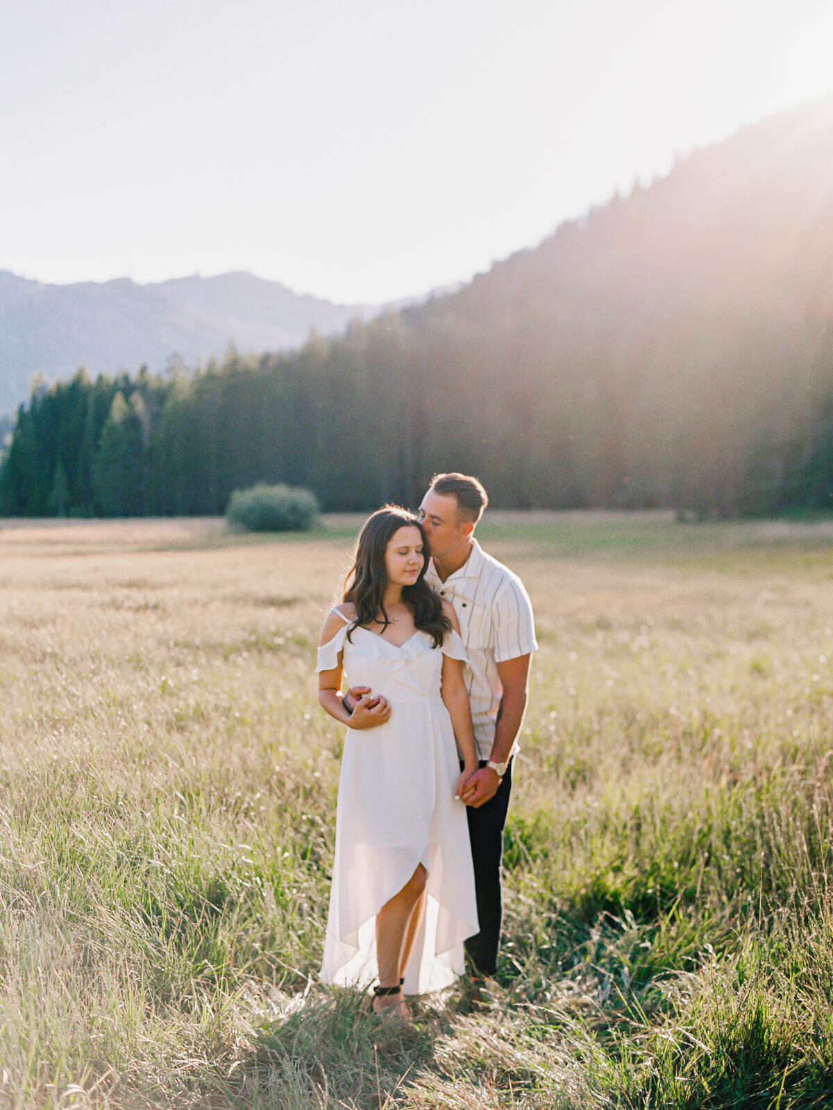 Just engaged couple in Lake Tahoe meadows and mountains