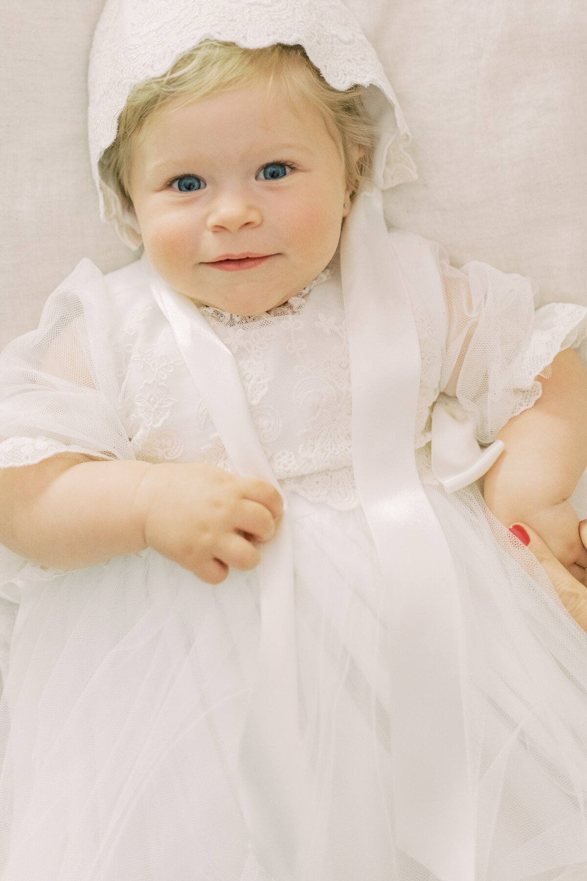 baby girl getting ready for her baptism in Oakville.