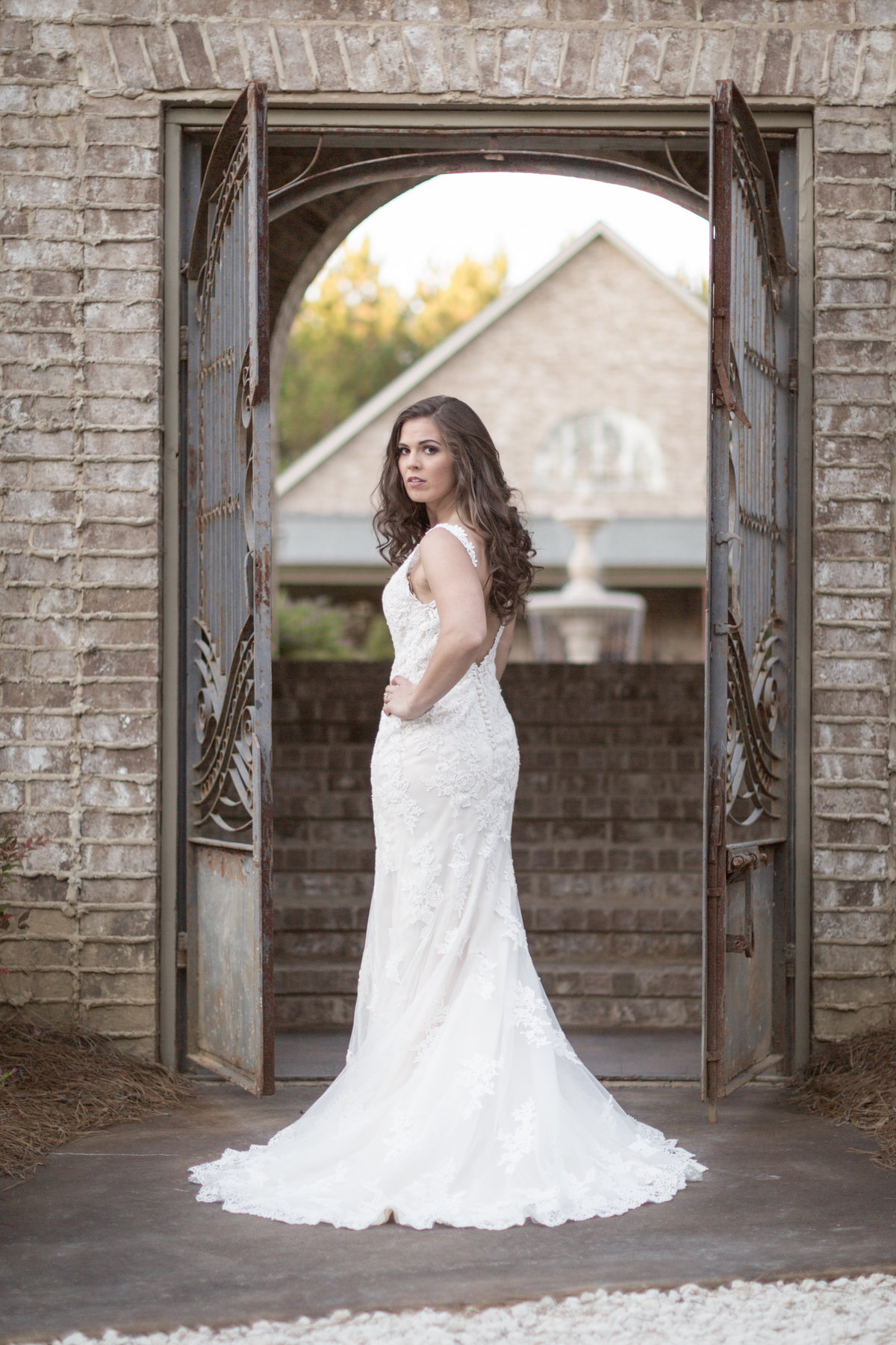 Ambient light photo of bride at Bela Sera Gardens in Loxley, Alabama.