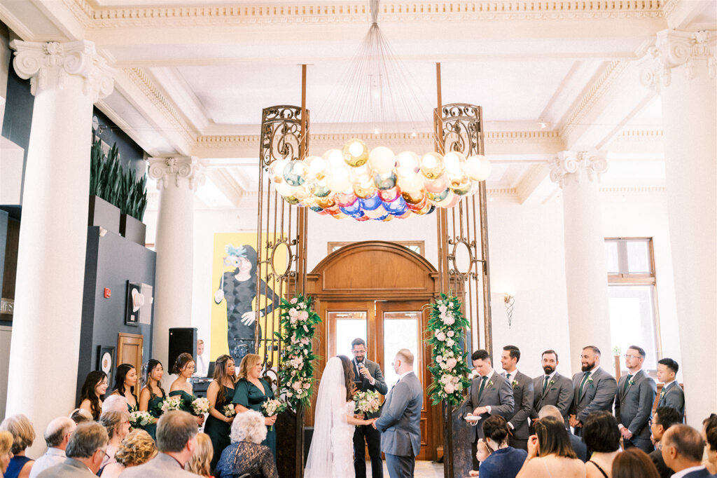 Elegant indoor wedding ceremony styled by Melissa Alison Events, a genuine and modern wedding planner based in Calgary, Alberta. Featured on the Brontë Bride Vendor Guide.