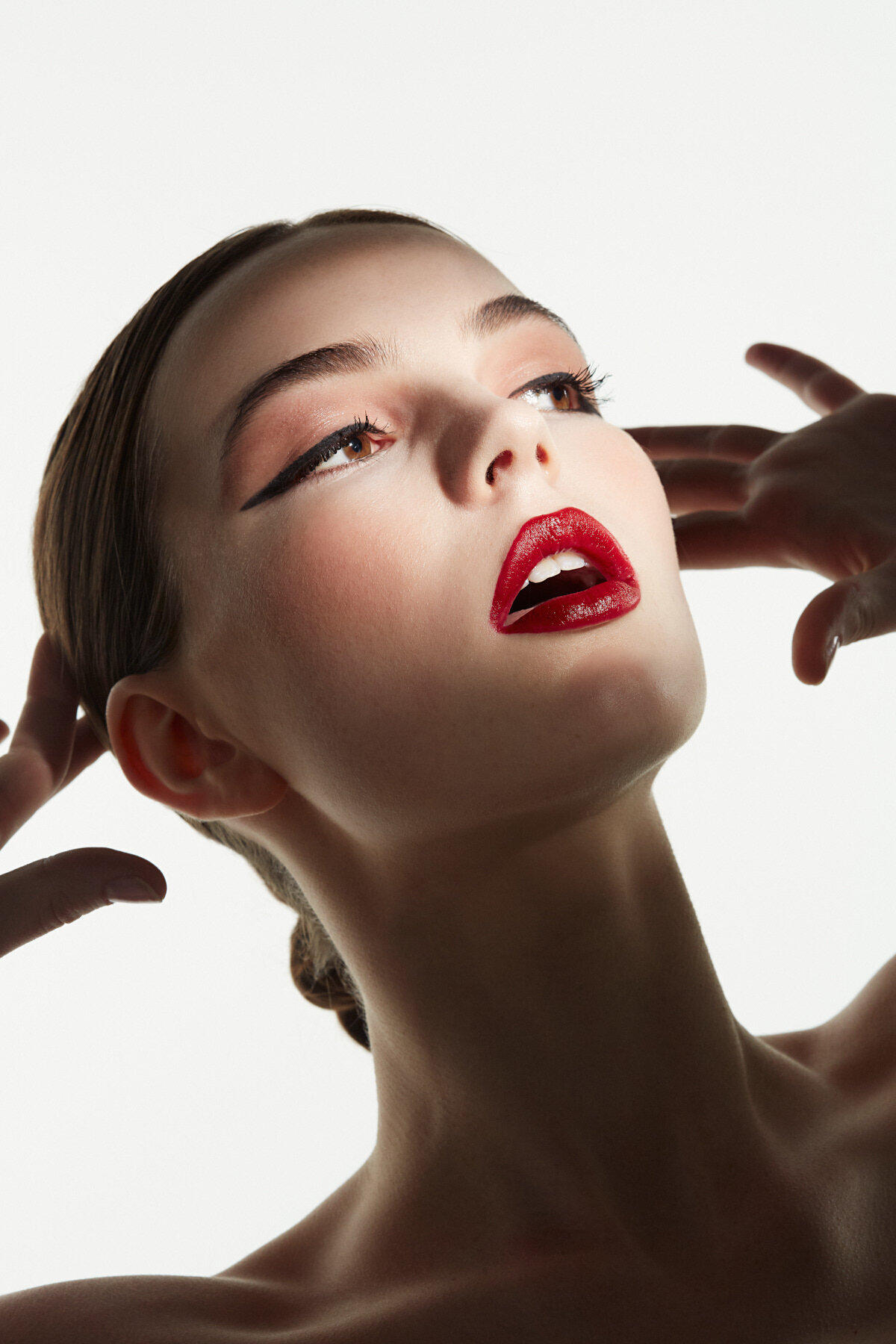Red Lip & Winged Liner by Mong Bui