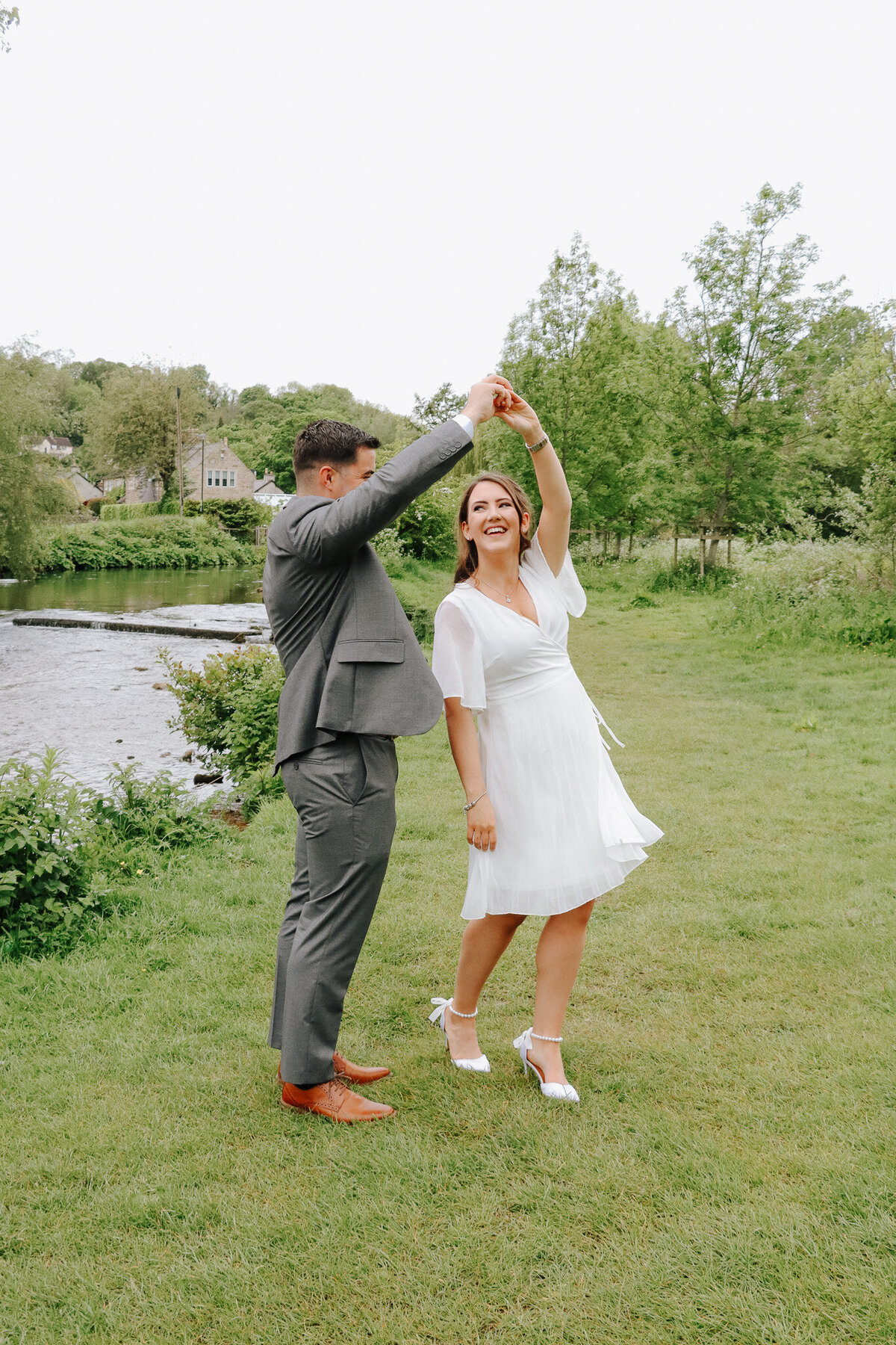 Evening portraits of the couple dancing captured by UK wedding photographer