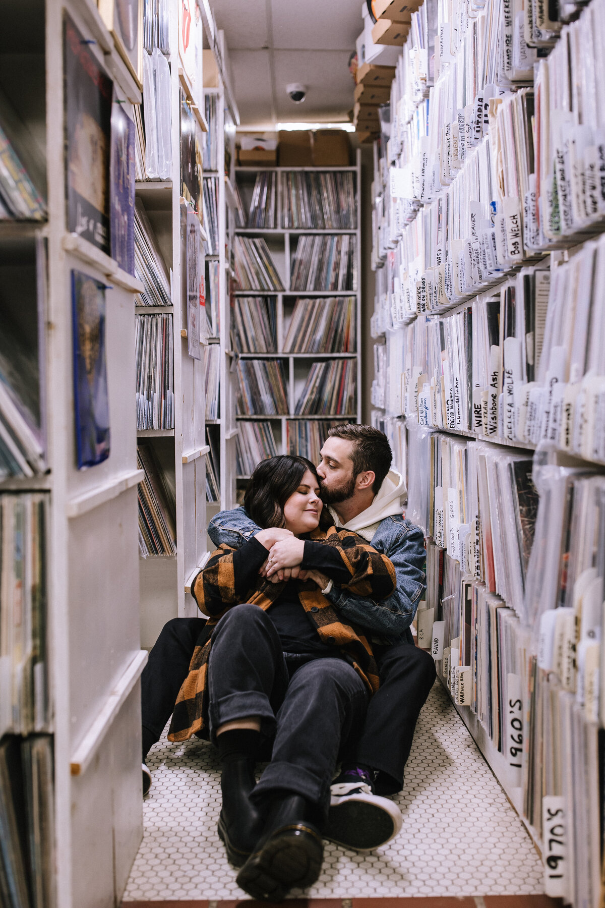 Engaged couple at Attic Record Store.