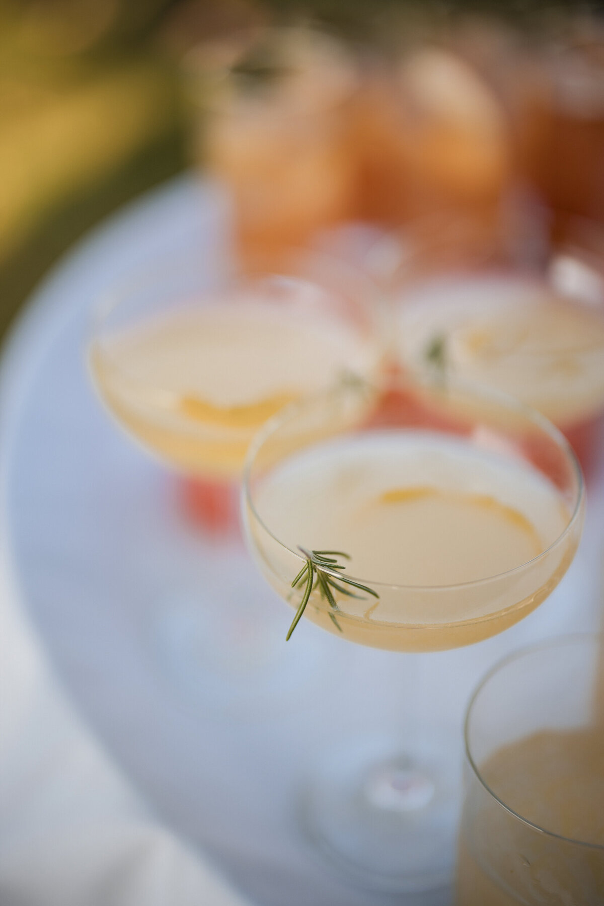A tray of custom cocktails at a destination wedding in Vermont