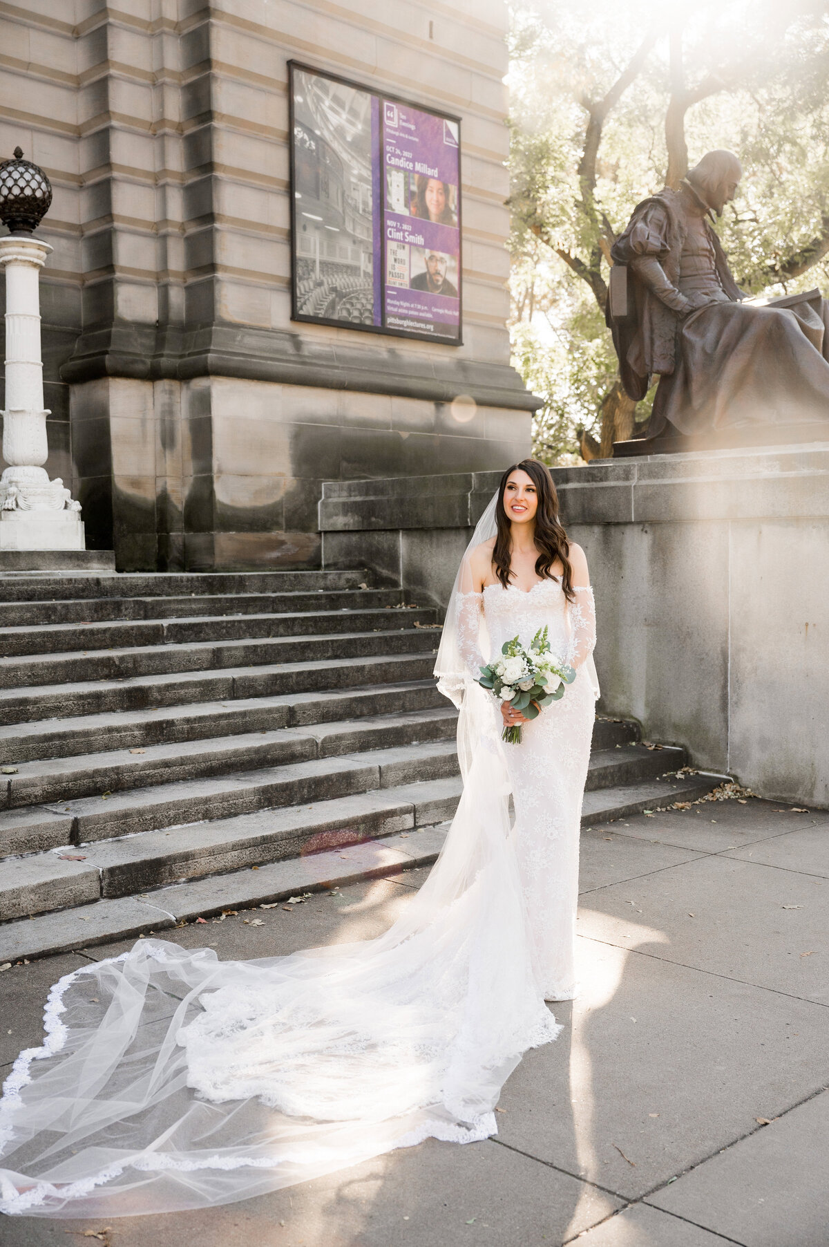 bride outside of the carnegie museum in the sunlight