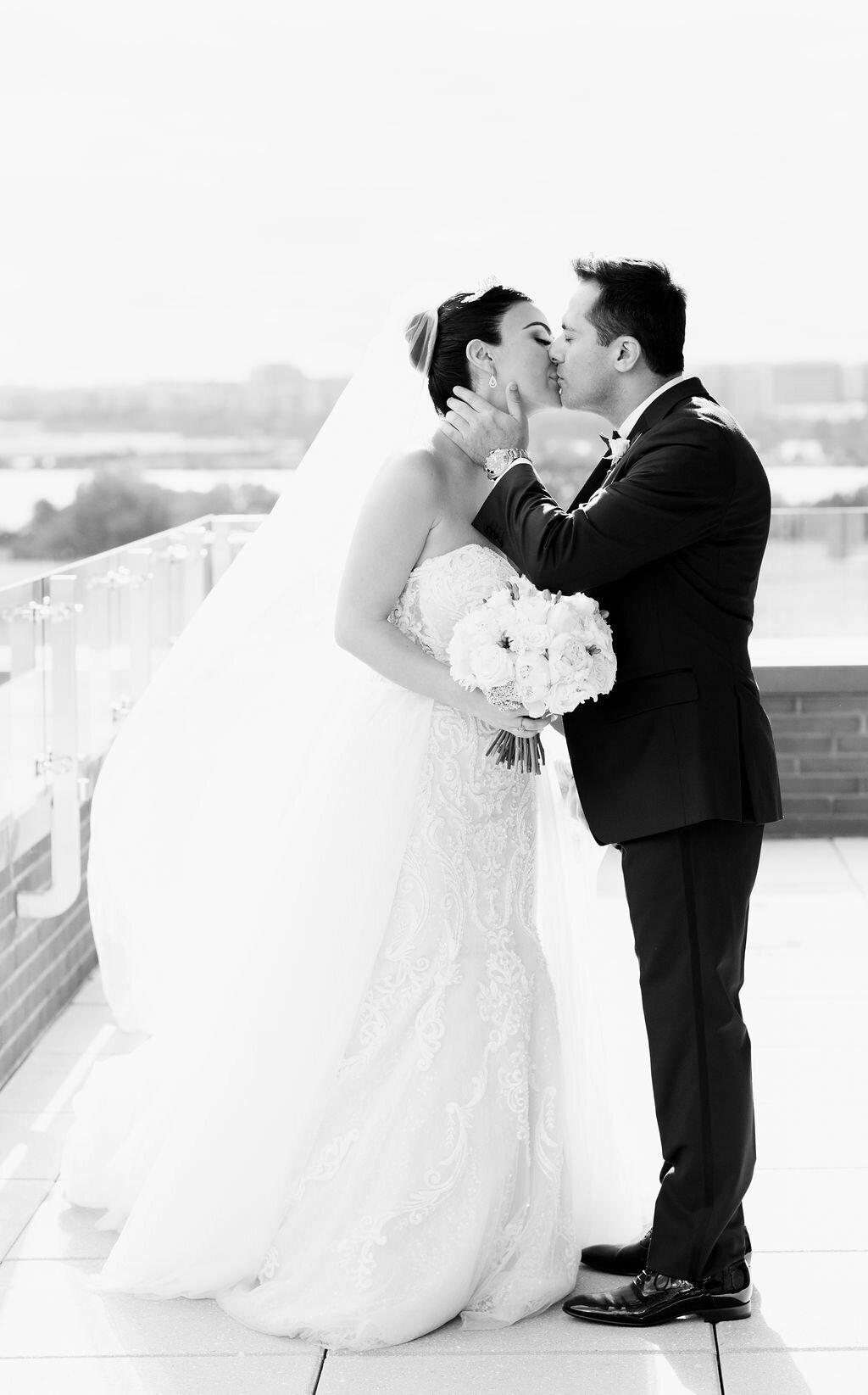 bride and groom kiss