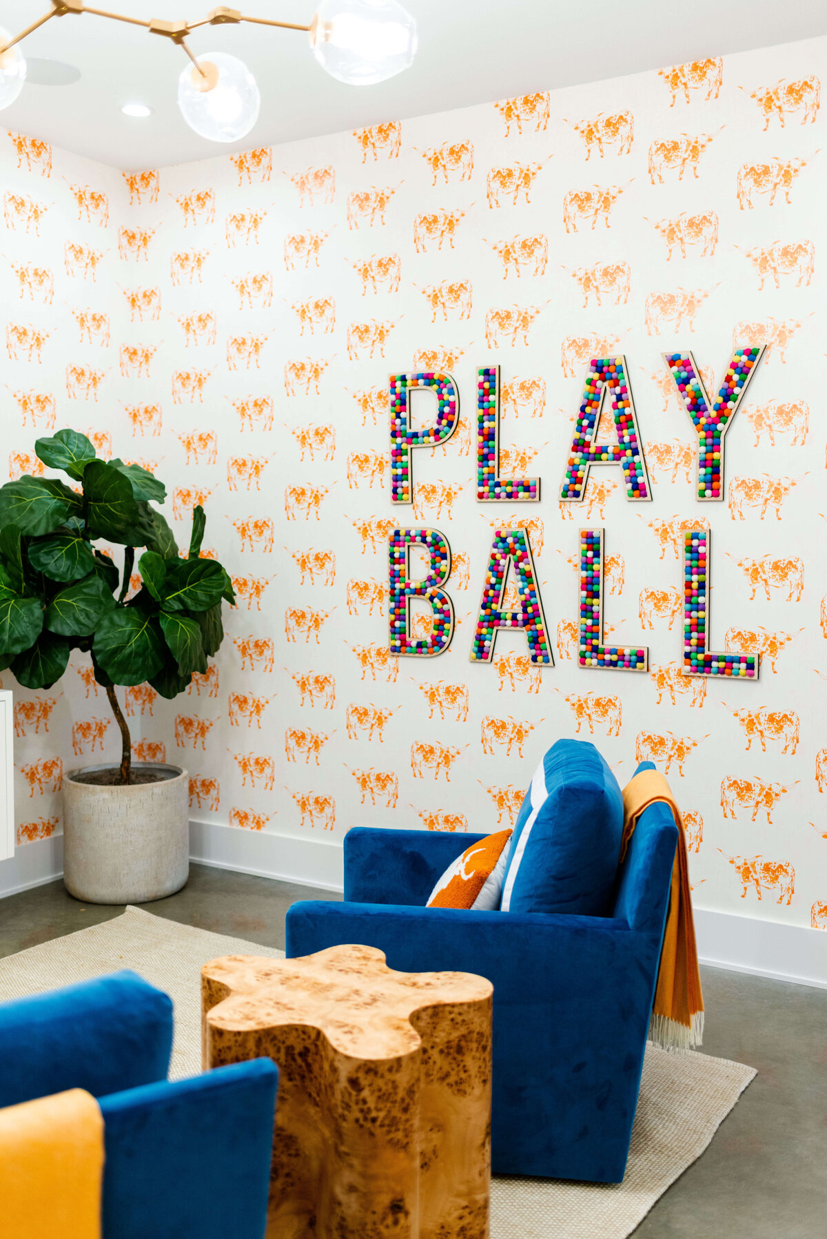oyster creek studios building belt new build orange cow wallpaper and blue chairs with play ball mural