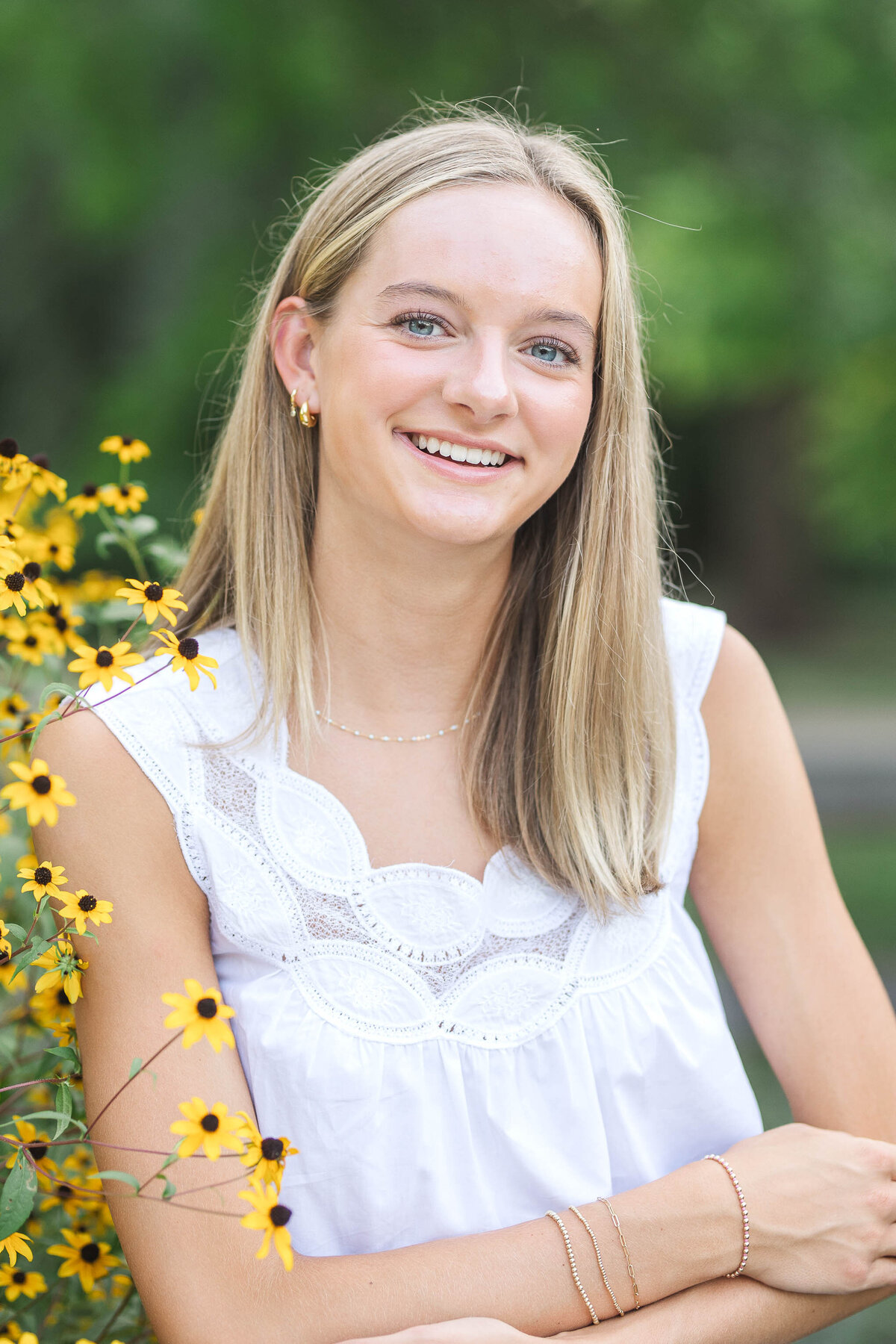 Columbus senior photography session at Franklin Park Conservatory, highlighting colorful blooms and nature