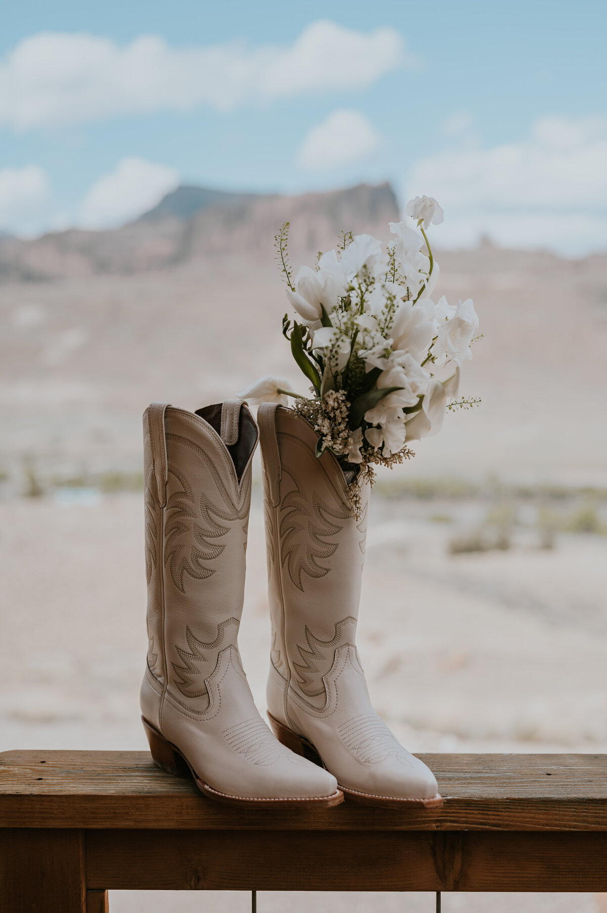 Wedding and elopement ceremony, photographer, Yellowstone, Wyoming, travel and destination, wedding, and elopement photographer cogirl boots for wedding