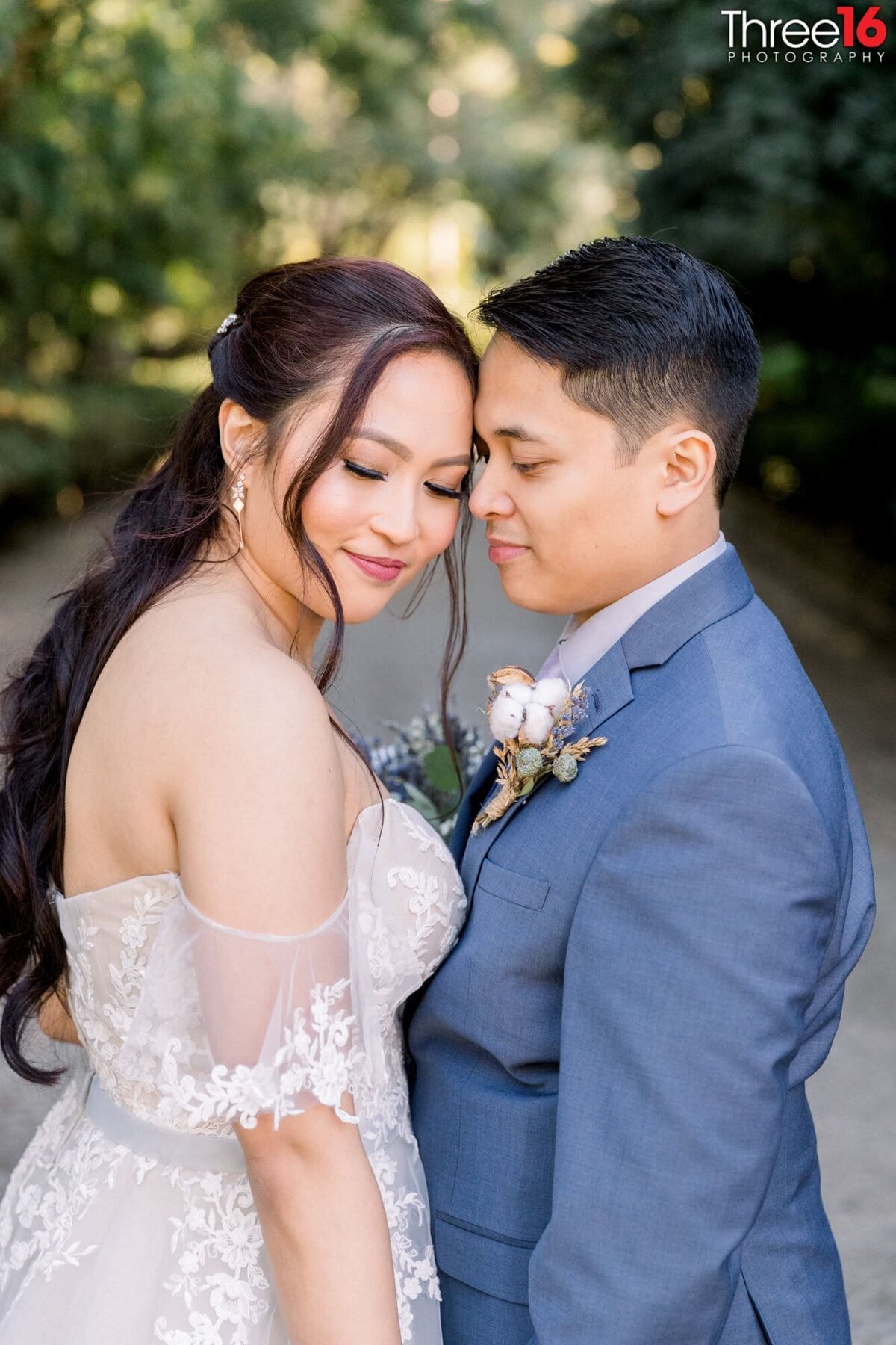 Tender moment for newly married couple during their photo session