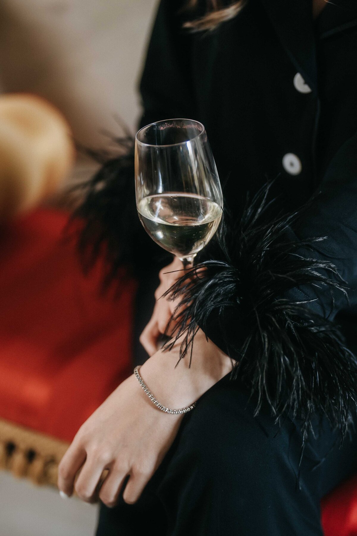 sophisticated bride drinking champagne at villa mangiacane