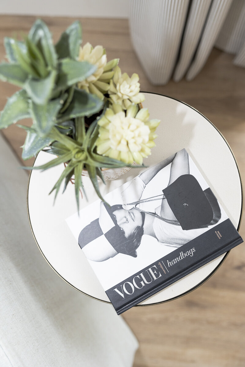 dewine design orlando interior designer belle isle vogue coffee table book on round table