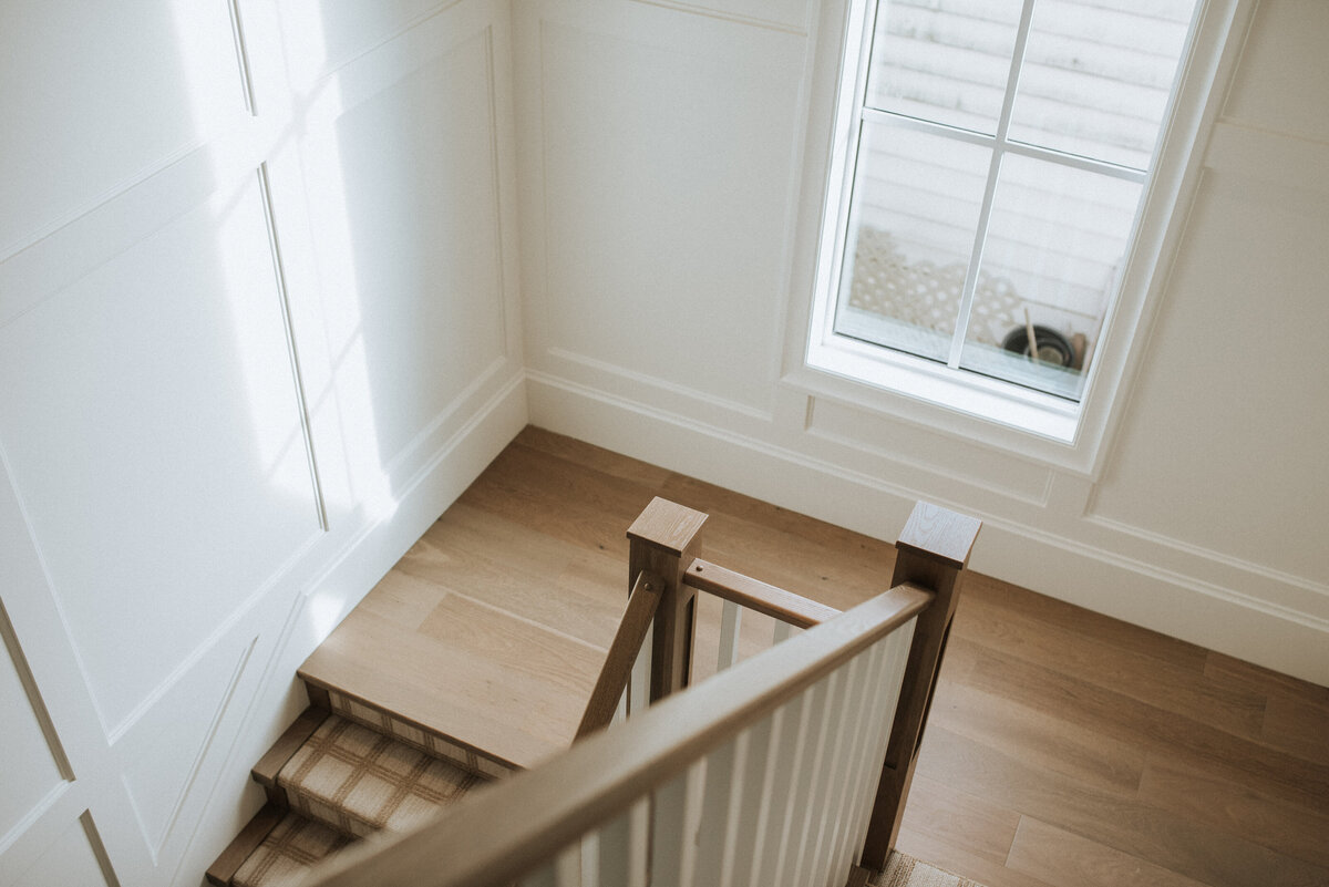 stairs-carpet-runner-wood-railing-1