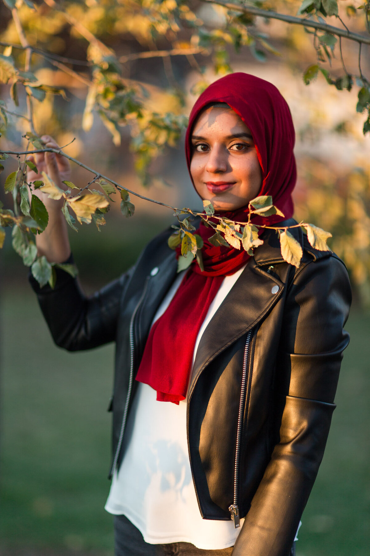 Discover the enchantment of Sana's portrait, a whimsical moment amidst nature where she gracefully rests a hand on a tree branch, skillfully captured by Lauren Duffy Photography. The natural surroundings become a tranquil backdrop, enhancing the serene beauty of this captivating scene. Lauren Duffy's lens expertly frames the connection between Sana and the tree, creating a harmonious blend of human grace and the quiet elegance of nature. Immerse yourself in the artistry that defines this portrait, where every detail tells a story of tranquility and the seamless integration of Sana with the timeless allure of the tree.
