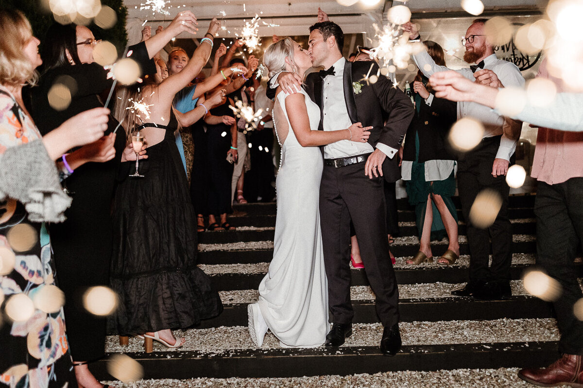 Bridgewater estate wedding photography with sparkler exit surrounded by friends