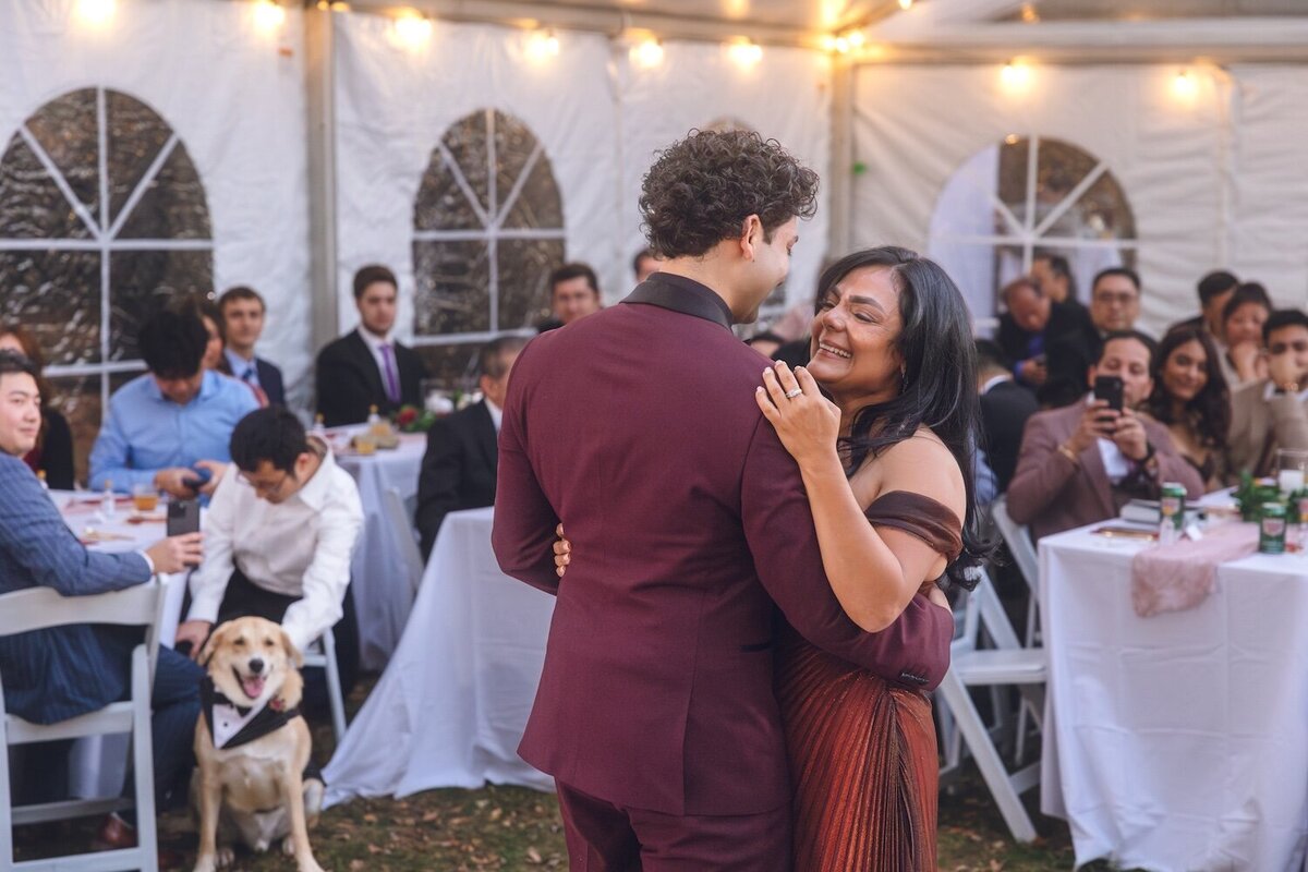 Groom dancing with his mom during the reception.