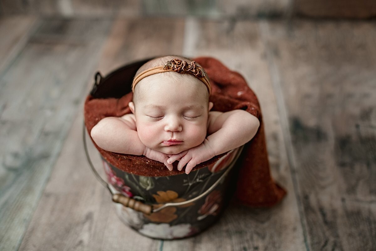 newborn-girl-in-fall-bucket