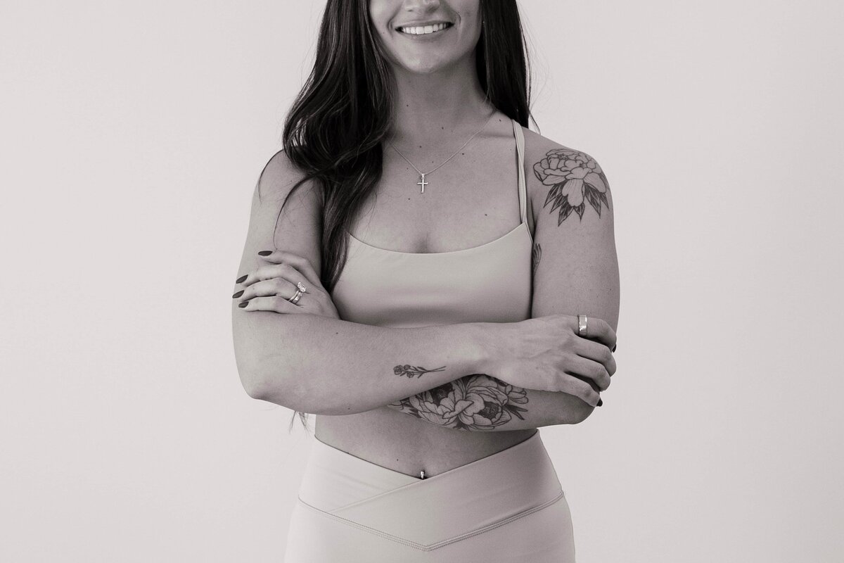 A black and white photo of a functional health coach.