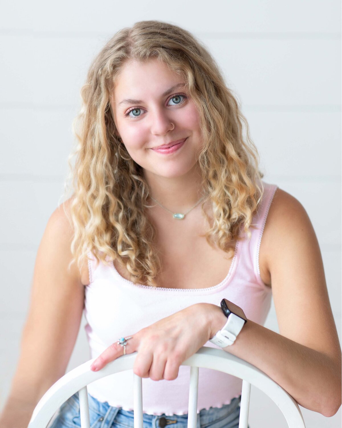 senior-high-school-girl-in-pink-on-white-wall