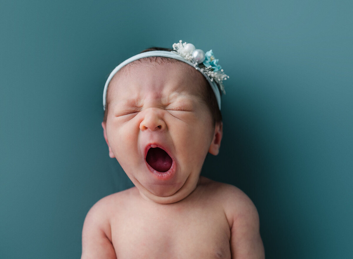yawning-newborn-girl-pensacola-photographer