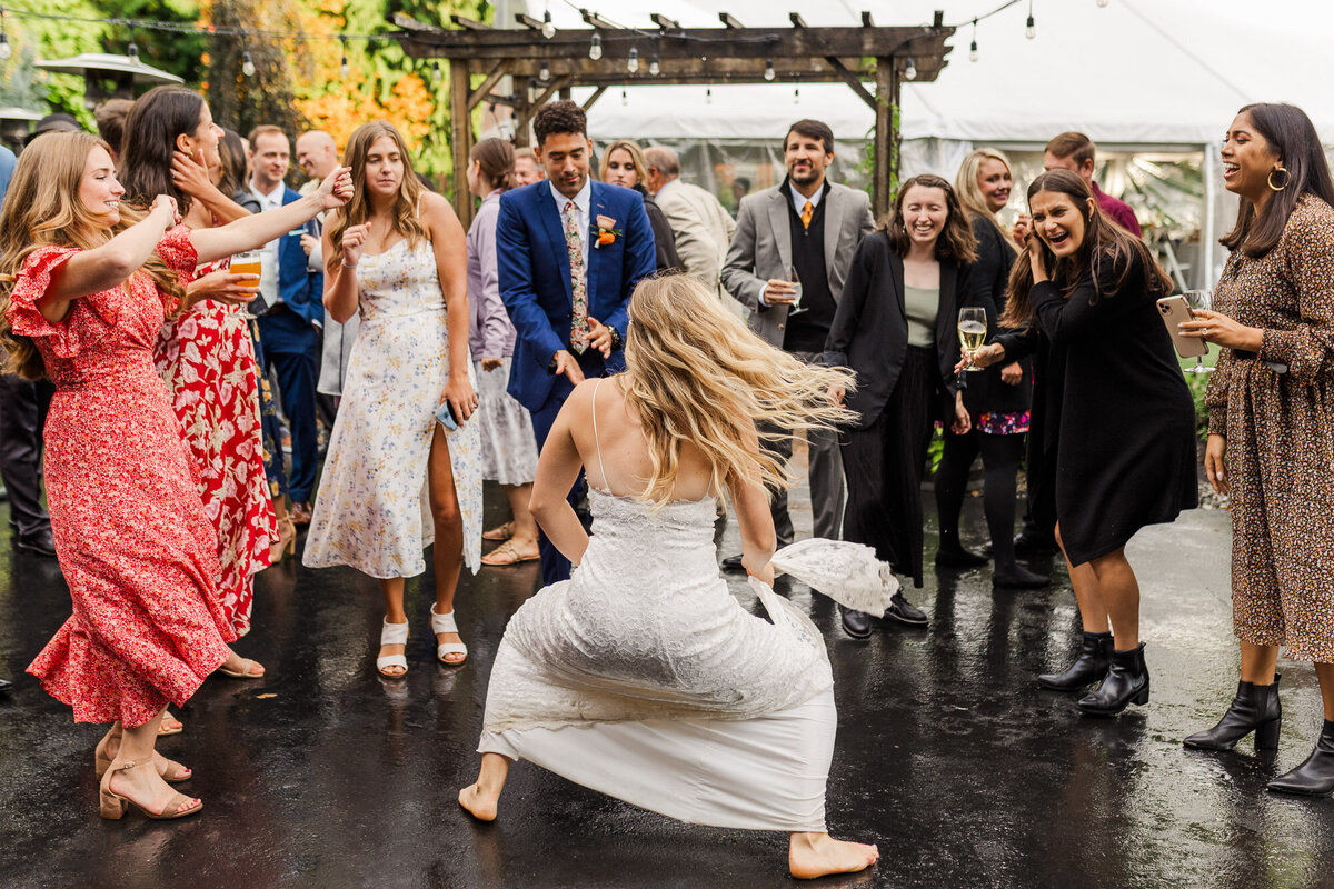 Bride-dances-at-fun-reception-at-Twin-Willow-Gardens-wedding-venue-in-Snohomish-WA-photo-by-Joanna-Monger-Photography