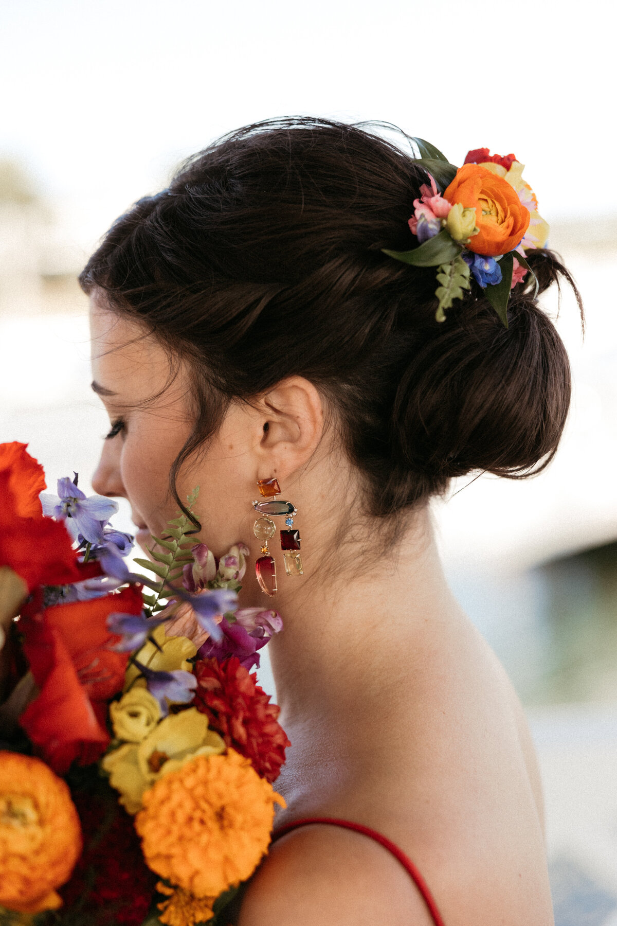 Bold and vibrant floral hair piece by Boston Florist Prose Florals, captured by  CAROLINE GIULIANO PHOTOGRAPHY