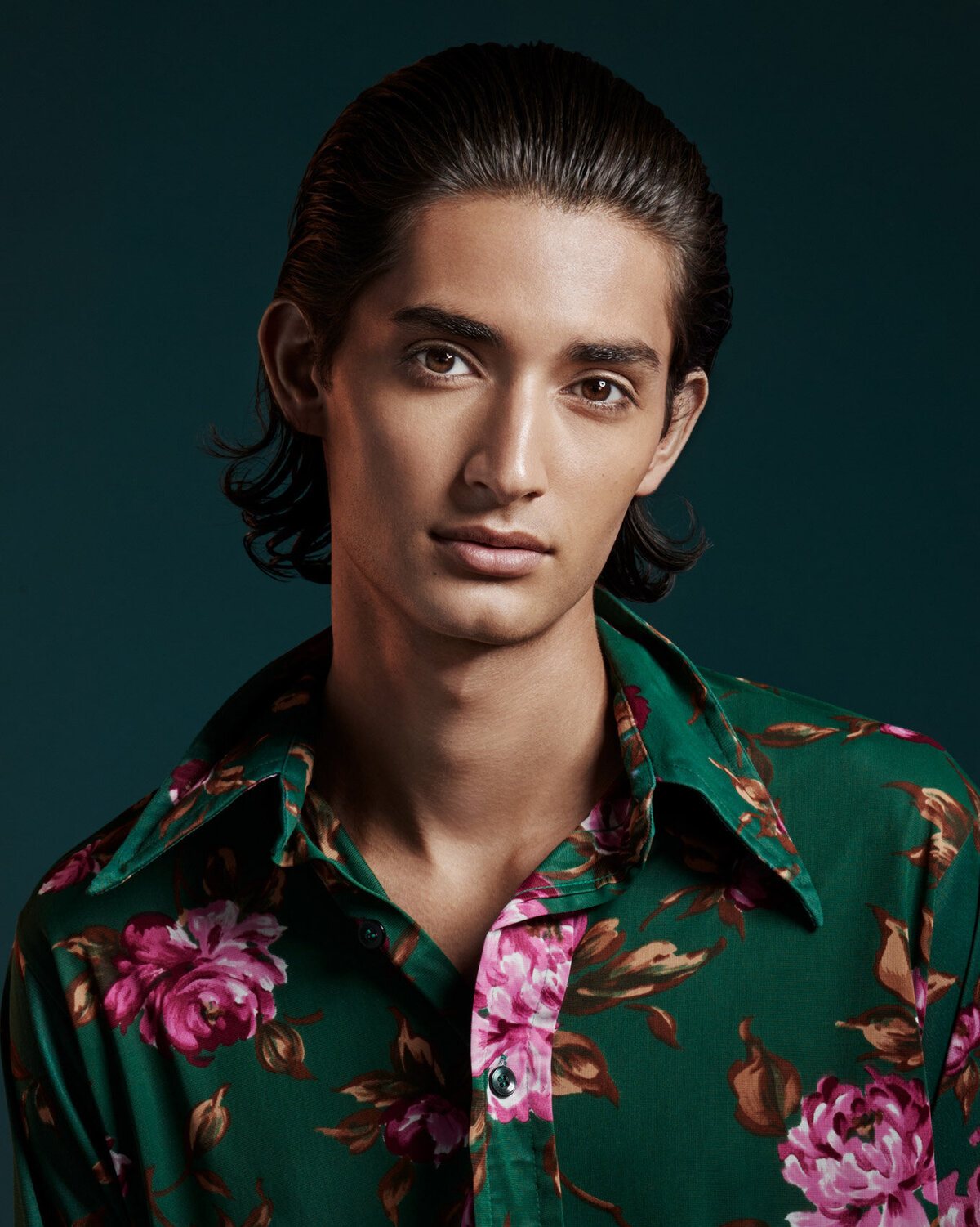 Striking portrait of Seb Mahal in a floral shirt, showcasing his confident style, photographed by Ylva Erevall.