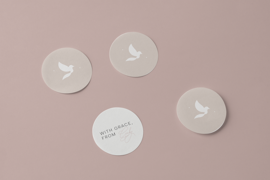 Set of round stickers featuring the Gaby & Grace dove icon and a “With Grace, from Gaby” message, used for sealing packaging and adding a personal touch.