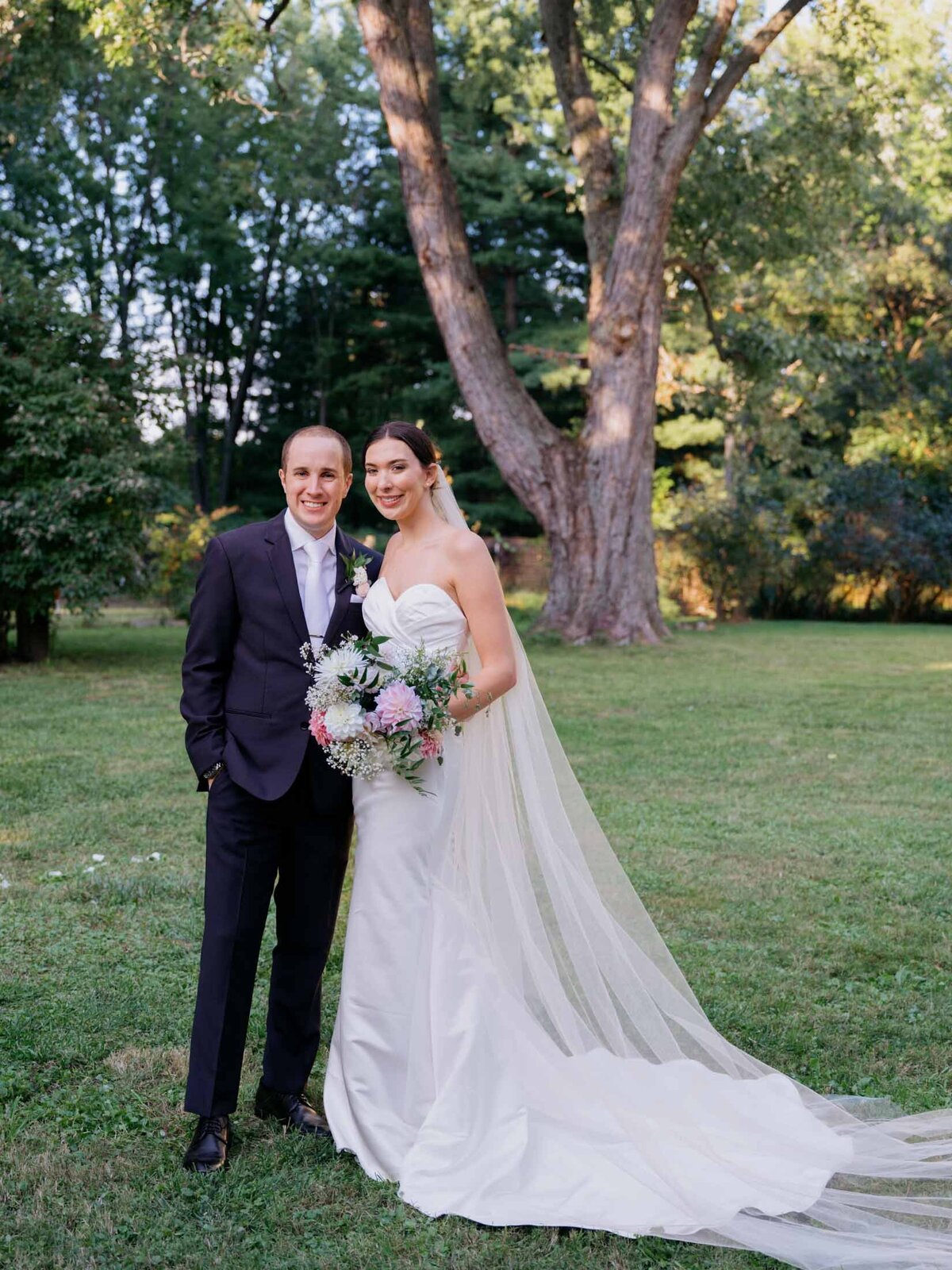 Classic bride and groom portrait at their private residence tented wedding.
