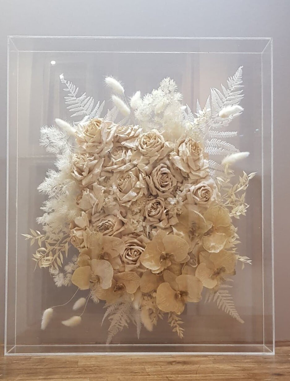 Wedding bouquet preserved inside perspex keepsake