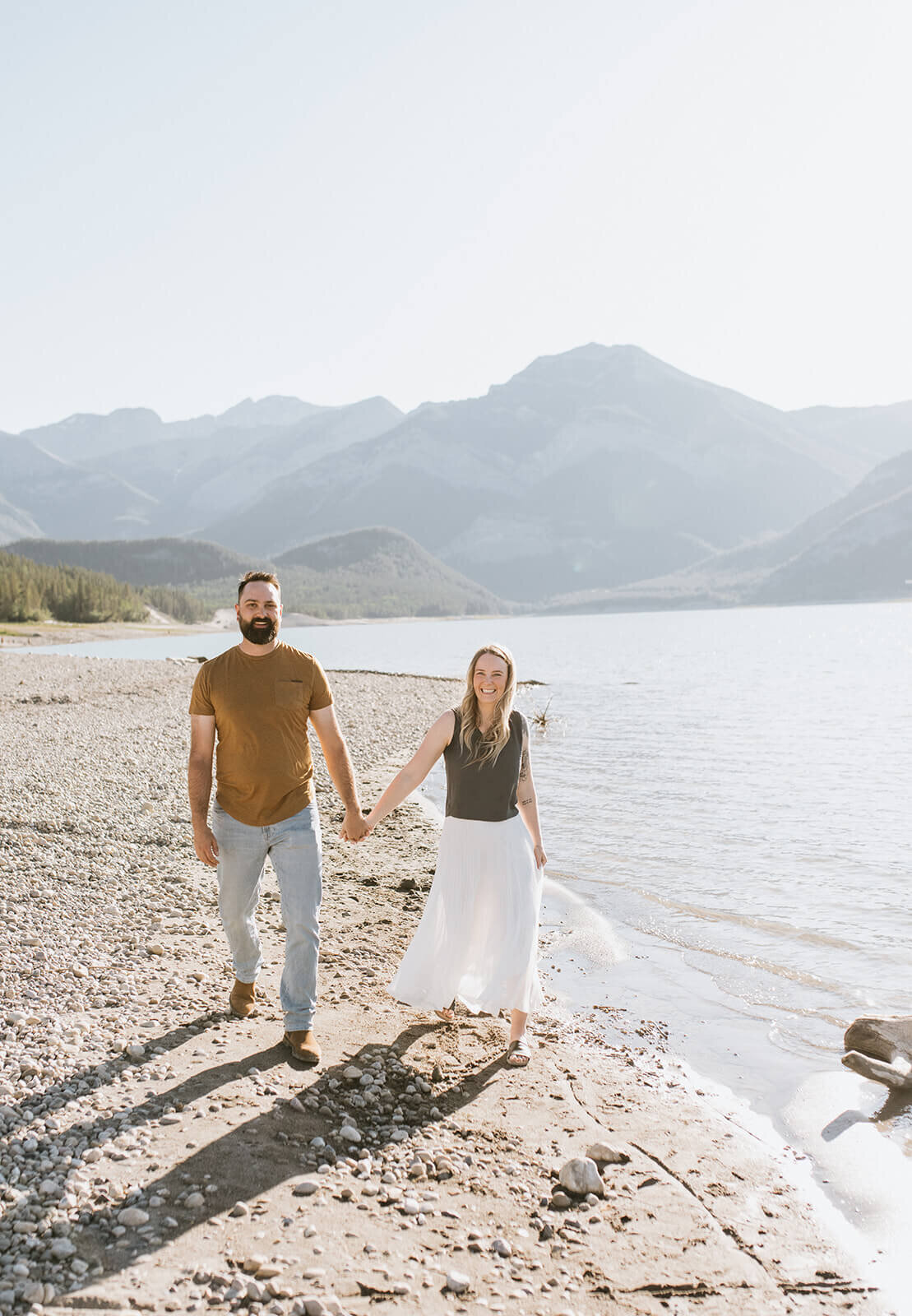 Couple-walking-down-beach