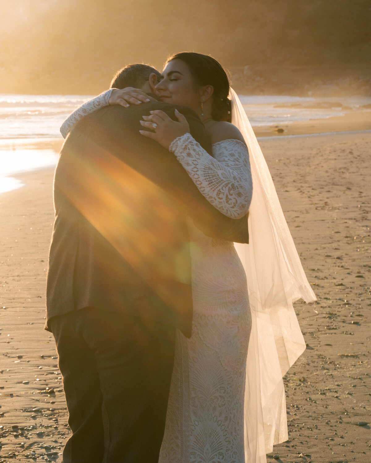 Sunset bride and groom pictures on the beach at Redwoods Forest
