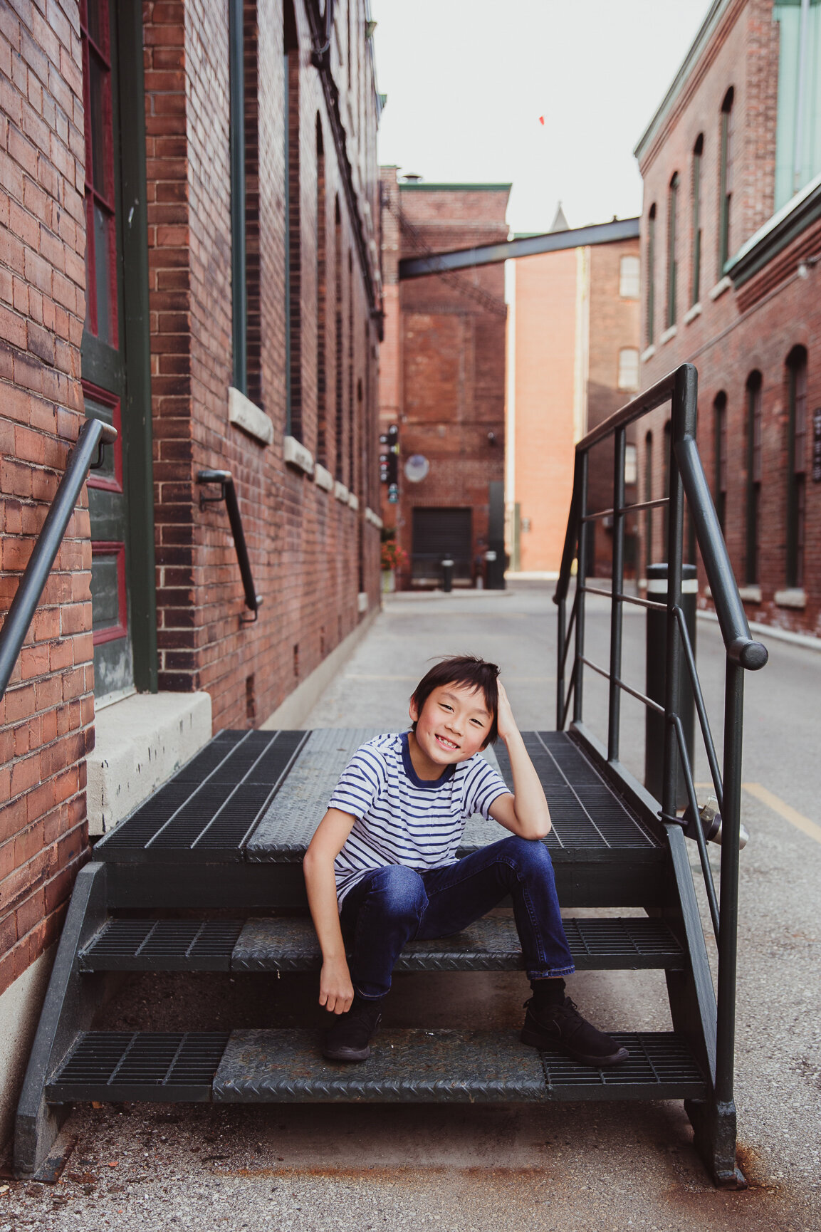 Solo portrait of 9 year old boy in Toronto