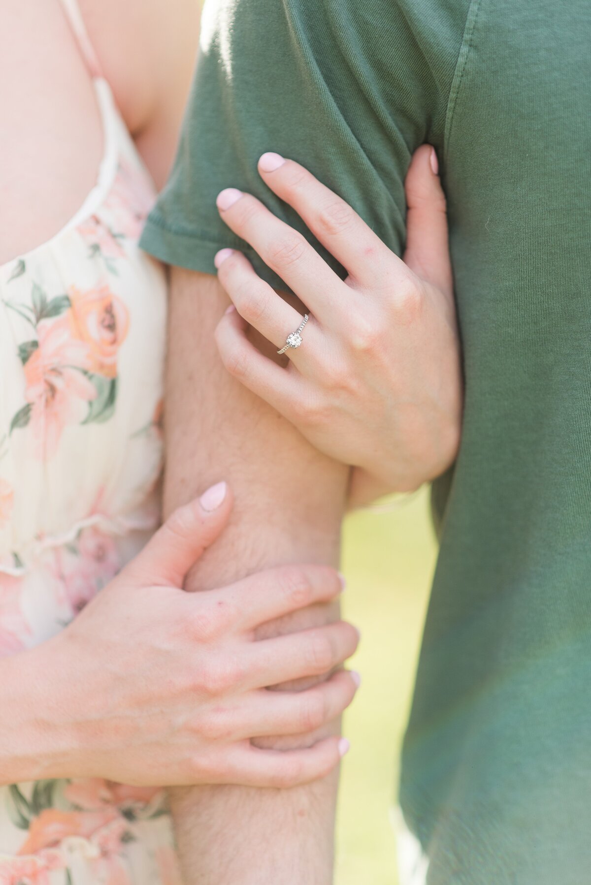 engagement ring close up couple