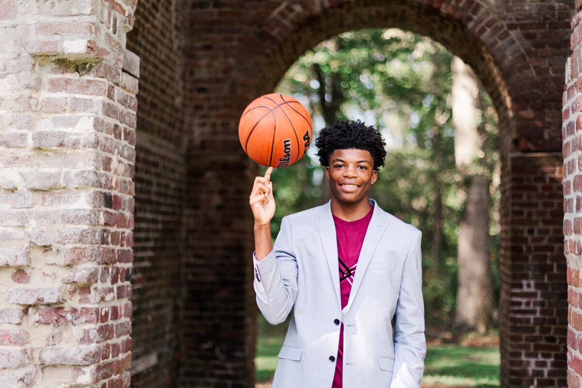 senior boy in South Carolina with a basketball