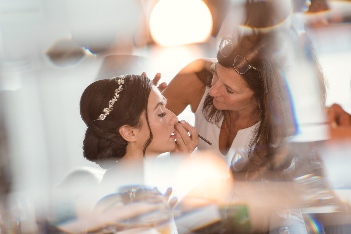 bride getting her makeup done for her big day at Maritime Parc