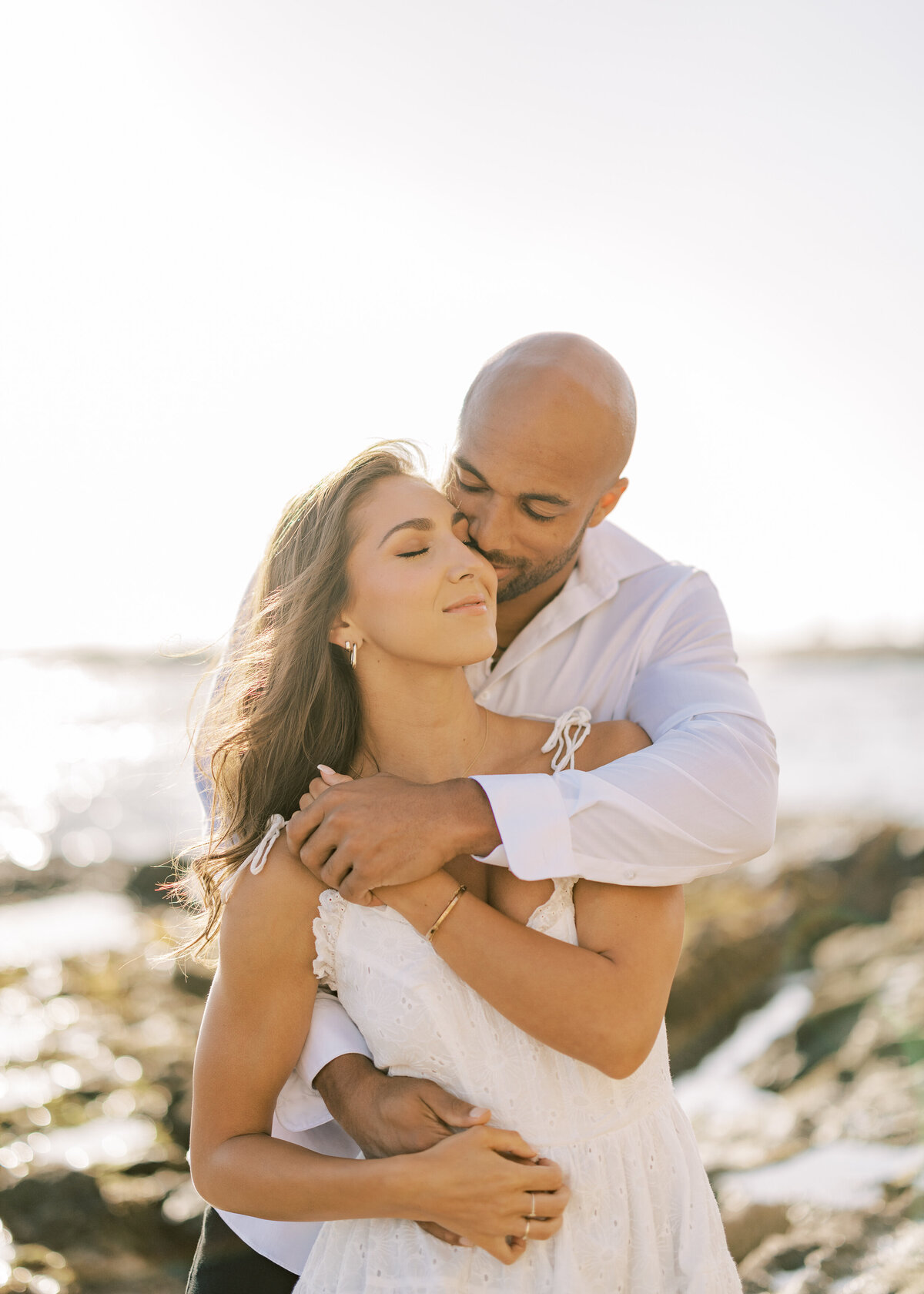 romantic and candid beach engagement photo
