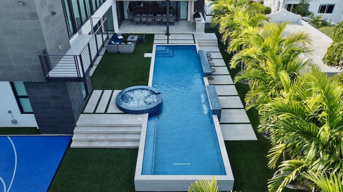 Long rectangular swimming pool and spa
