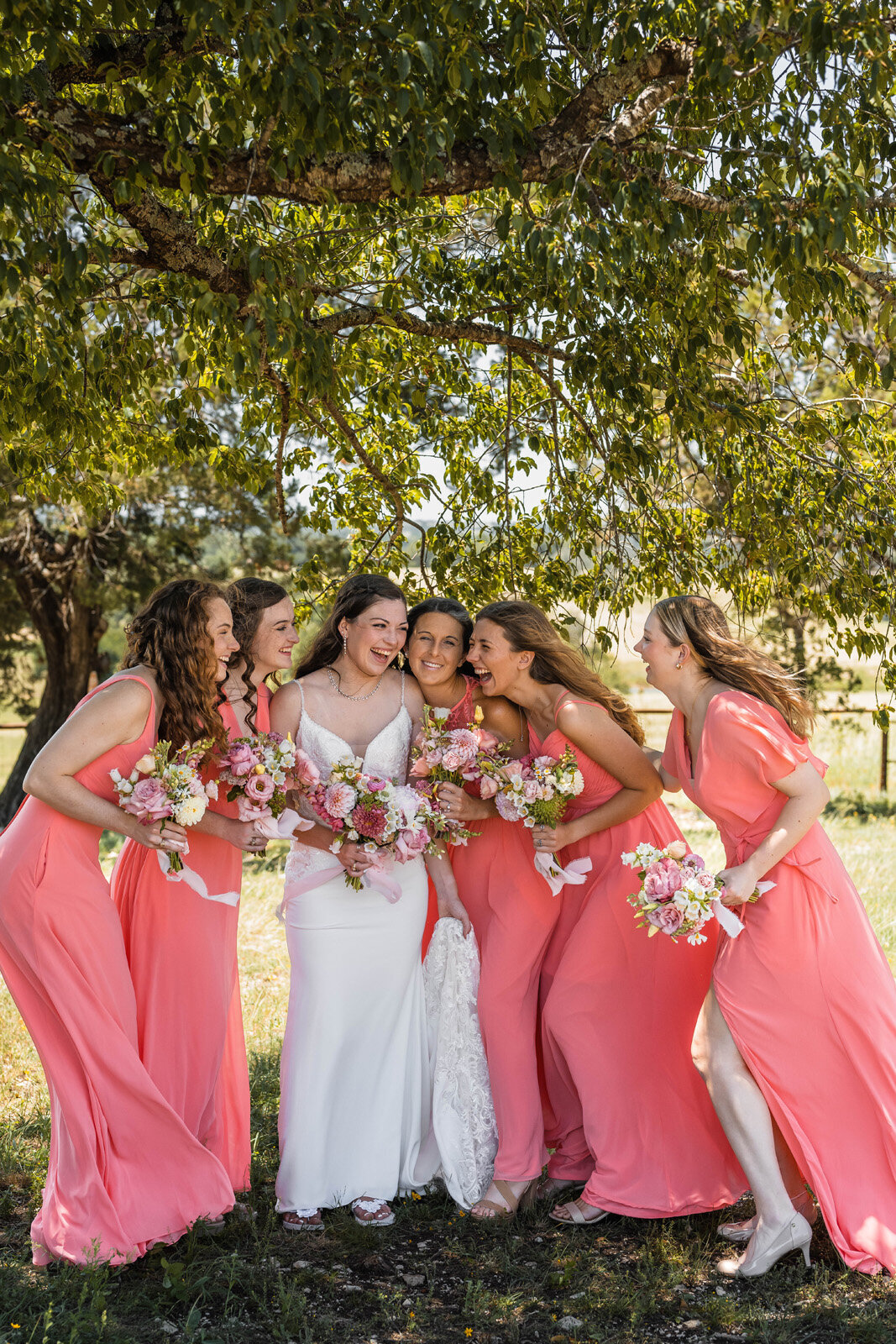 Vallosio-Photo-and-Film_bride-laughing-bridesmaids