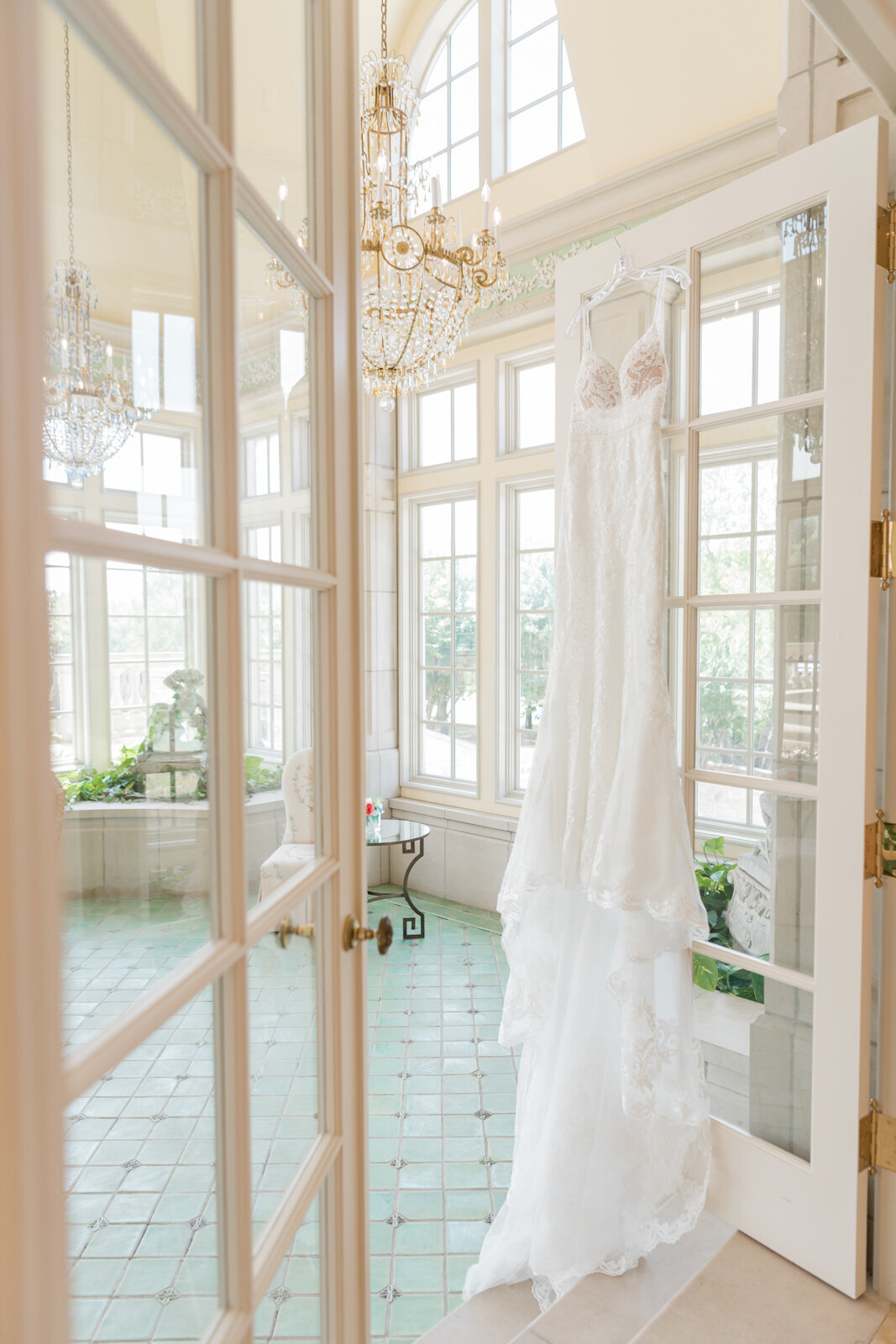 Wedding dress displayed in a beautiful European-style room at The Olana wedding venue