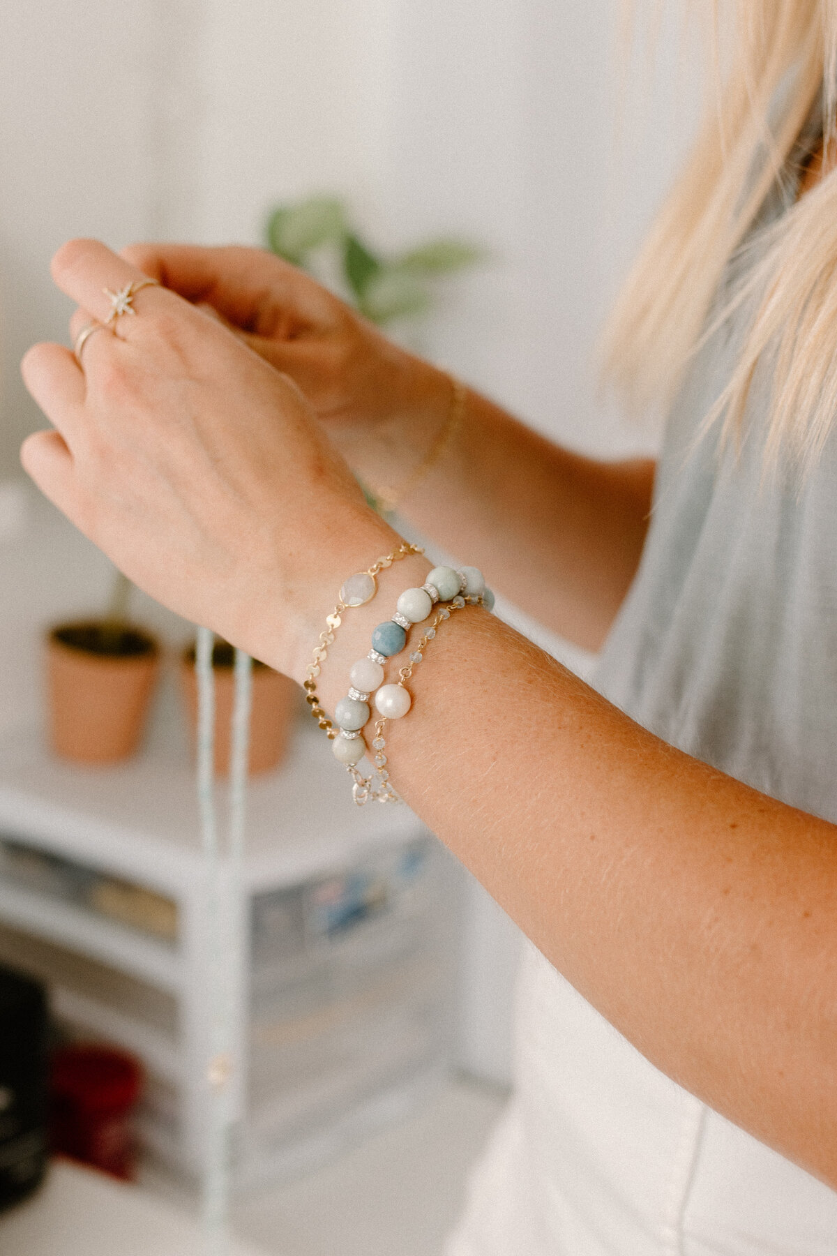 woman hand with handmade bracelets