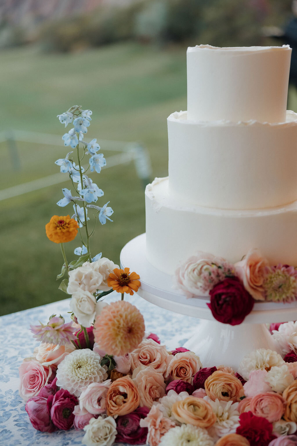 white pink and purple floral themed cake design