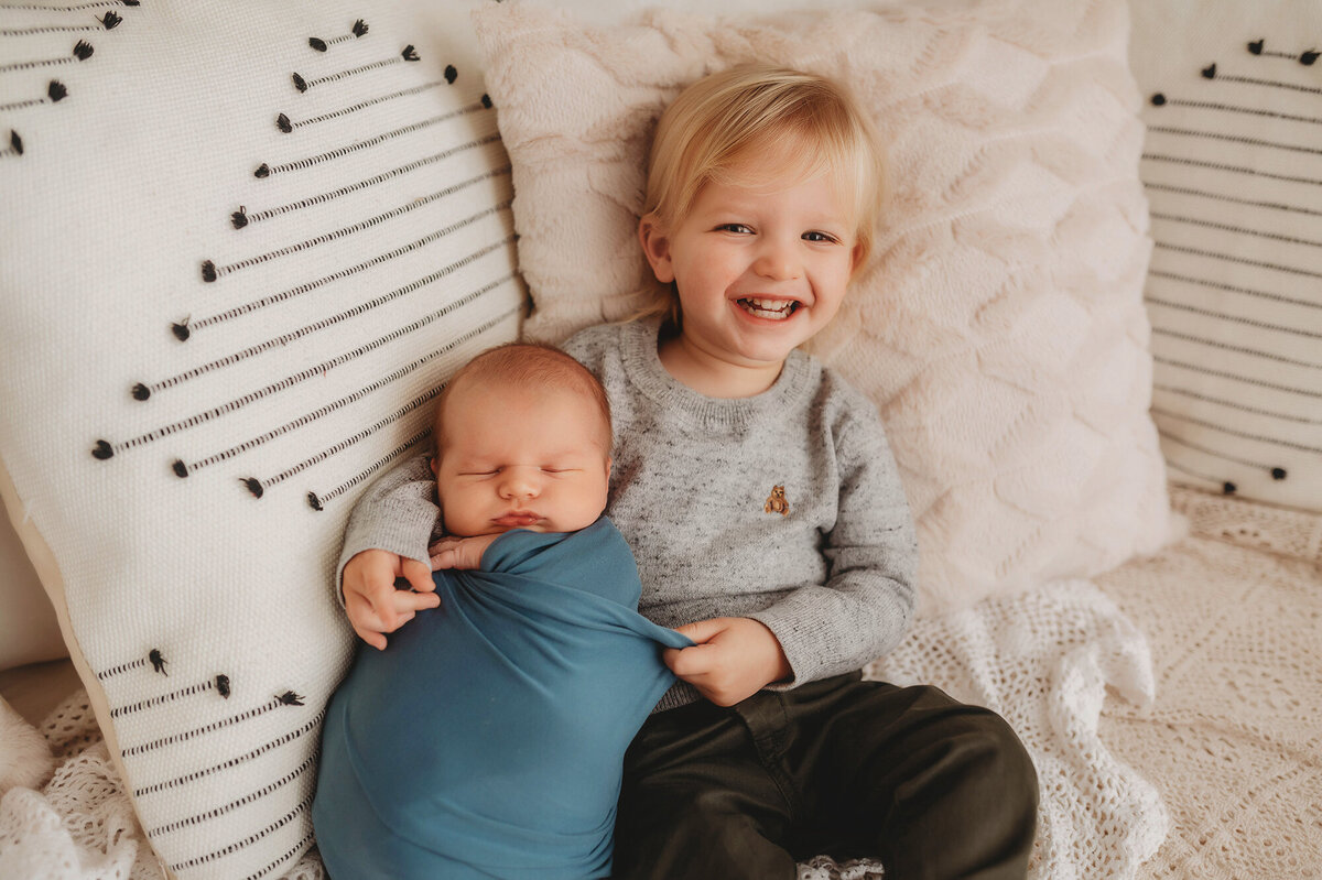Sibling photos during Newborn Portrait Session in Charleston, South Carolina.
