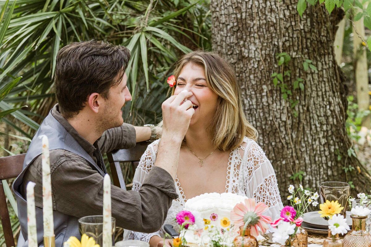 60-groom-puts-frosting-brides-nose