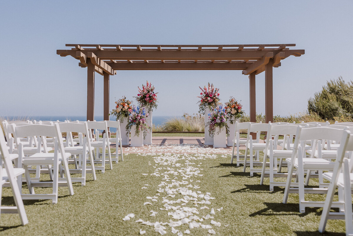 terranea resort wedding ceremony, flower columns, catalina point.